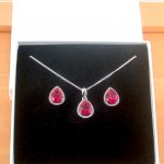 sterling silver ruby &Cz necklace and earrings