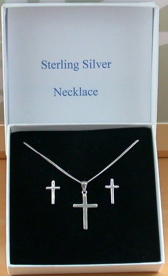 silver cross necklace and earrings