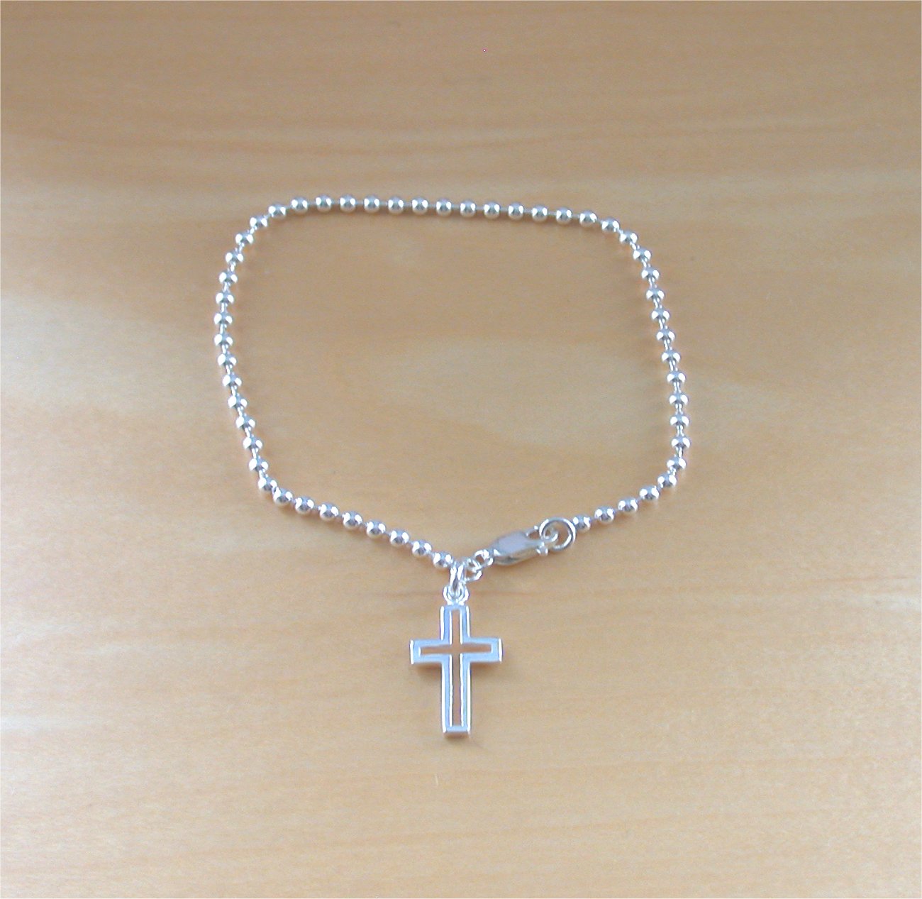 silver bracelet with cross