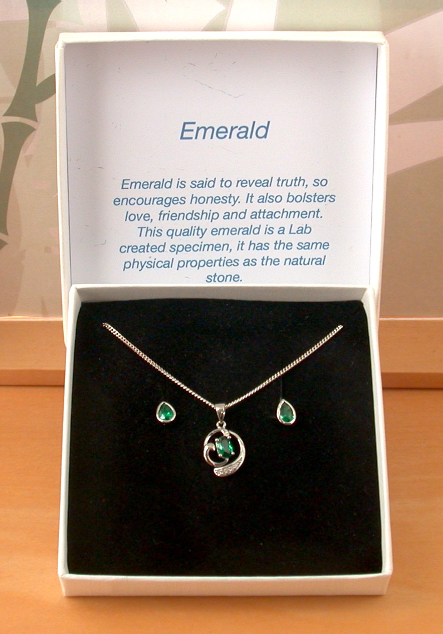 silver emerald necklace and earrings
