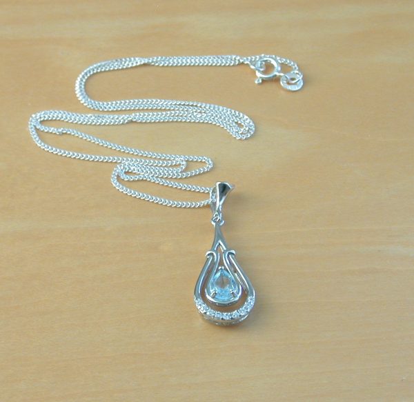 silver topaz and cz necklace