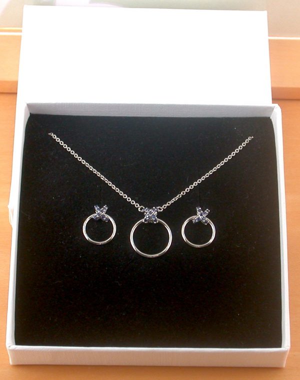 sapphire circle necklace and earrings