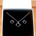 peridot circle necklace and earrings