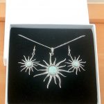 white opal sun necklace and sun earrings