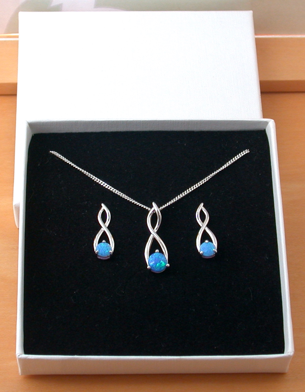 sterling silver blue opal necklace and earrings