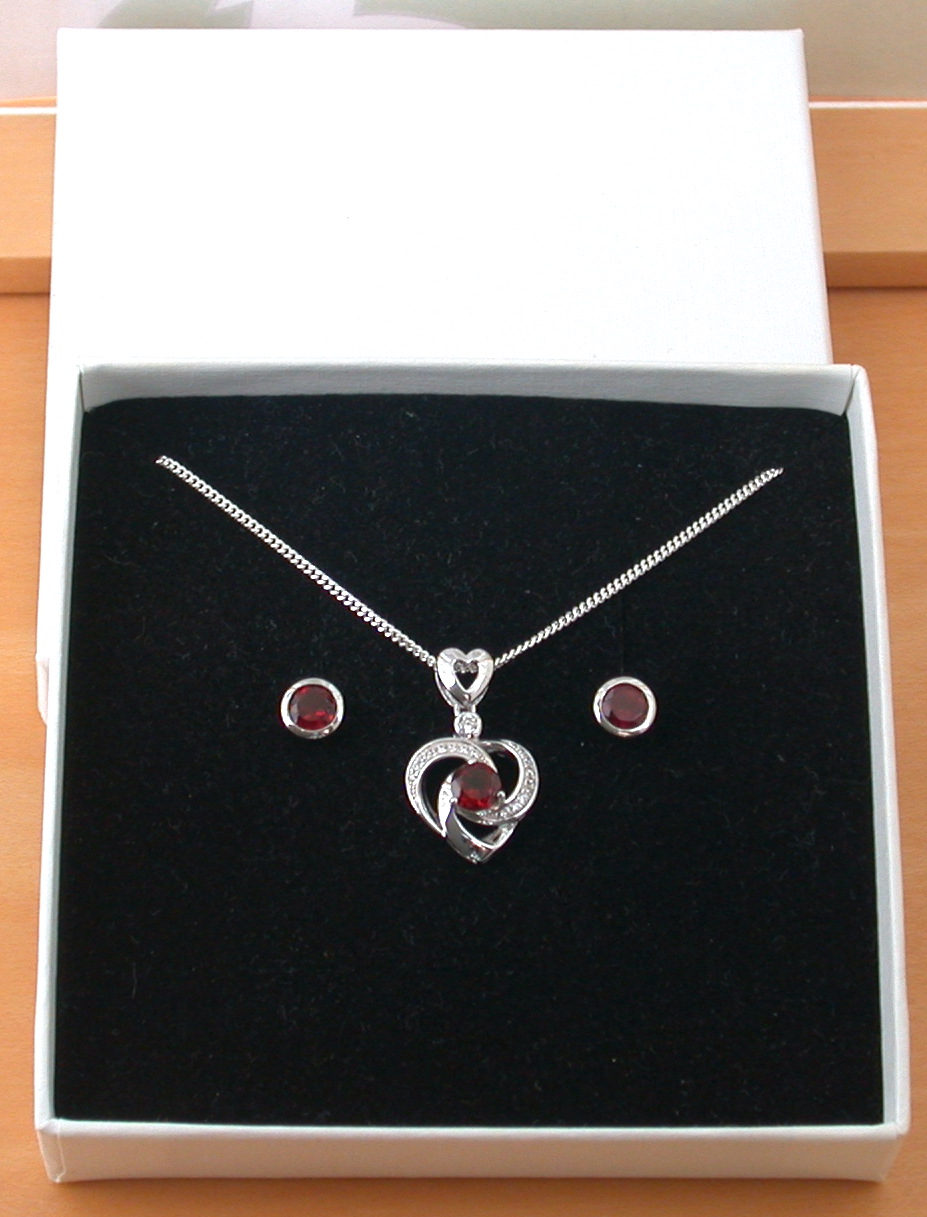 sterling silver garnet heart necklace and earrings