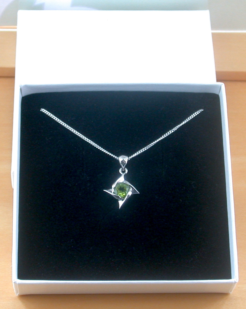 peridot star necklace in gift box